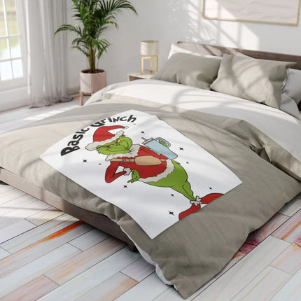 Basic Grinch illustration on bed with pillow product