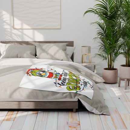Feliz Navidad Grinch holiday themed blanket product